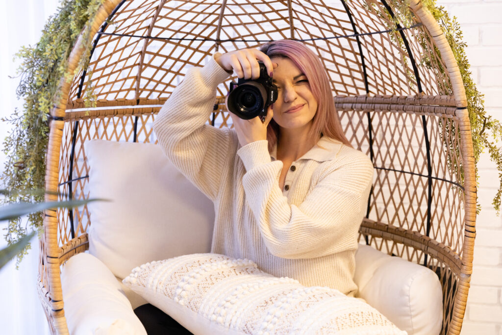 Girl with camera in a boho chair. Katie Gilbert Photography. Peoria, Arizona.